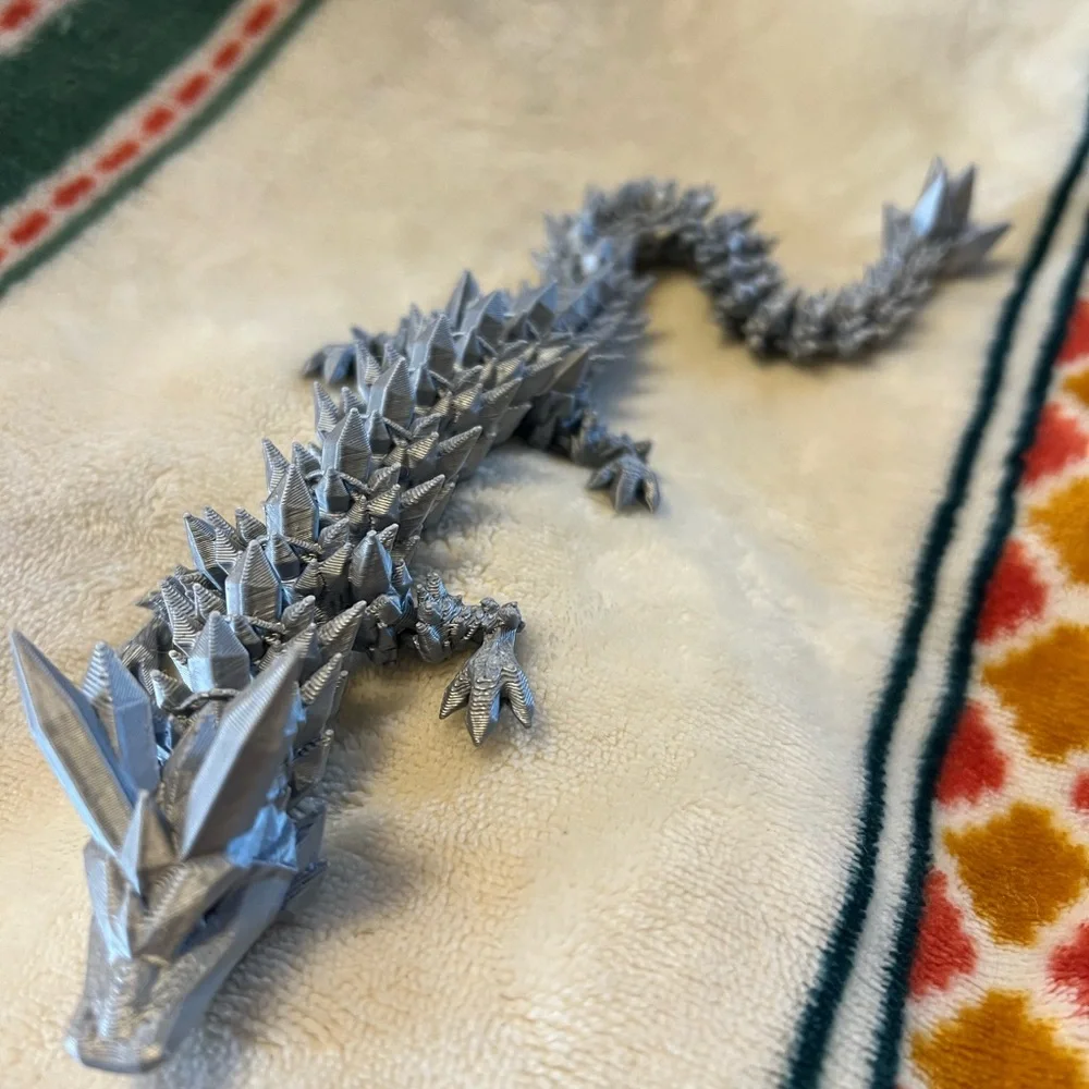 Silver 3-D printed dragon